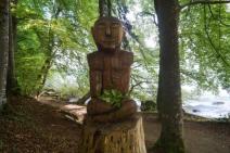 Wooden sculptures along the lakeside walking path